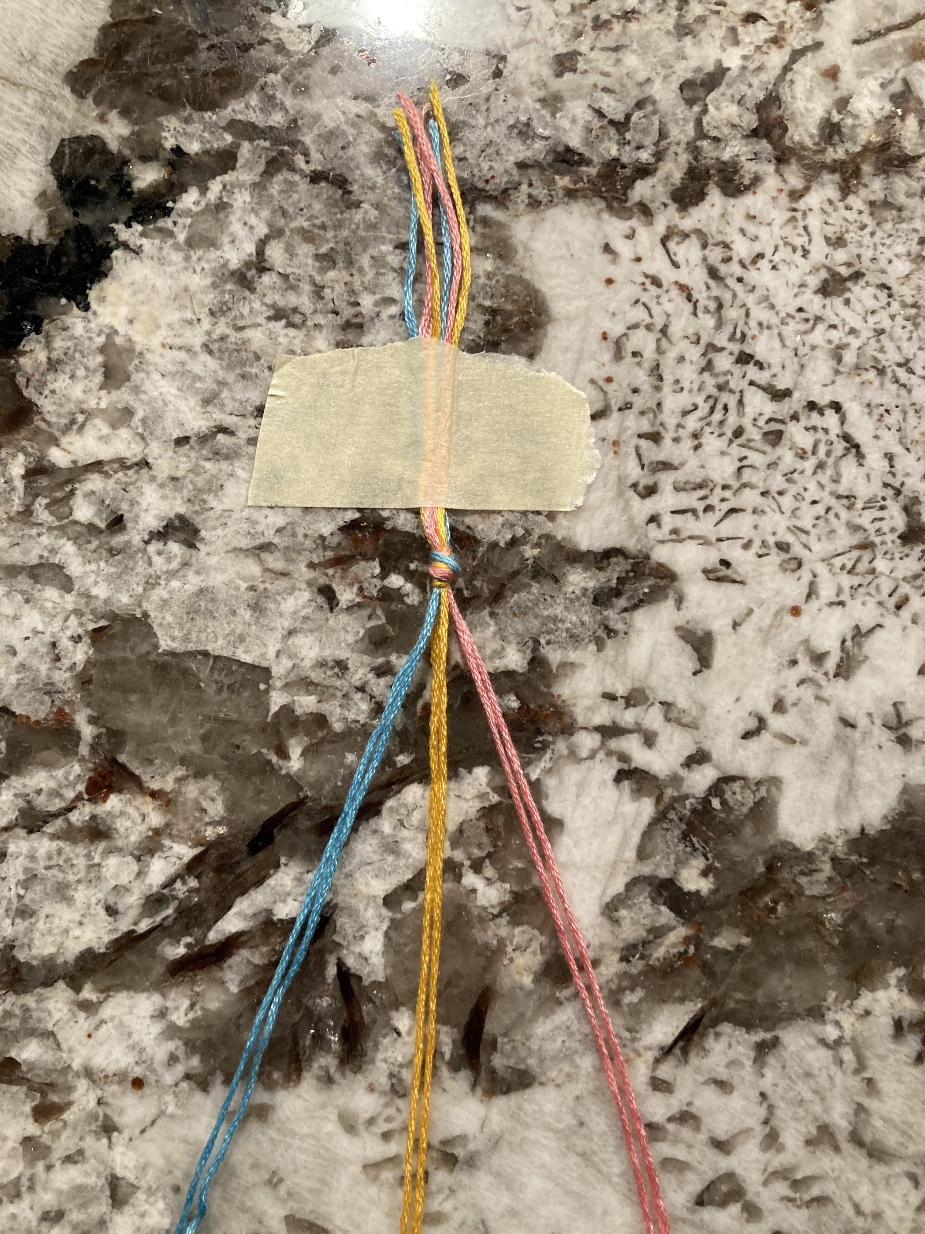 strings taped down.jpg