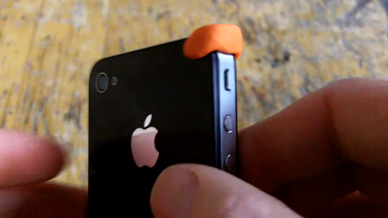 sugru - iPhone 4 - press onto glass.jpg