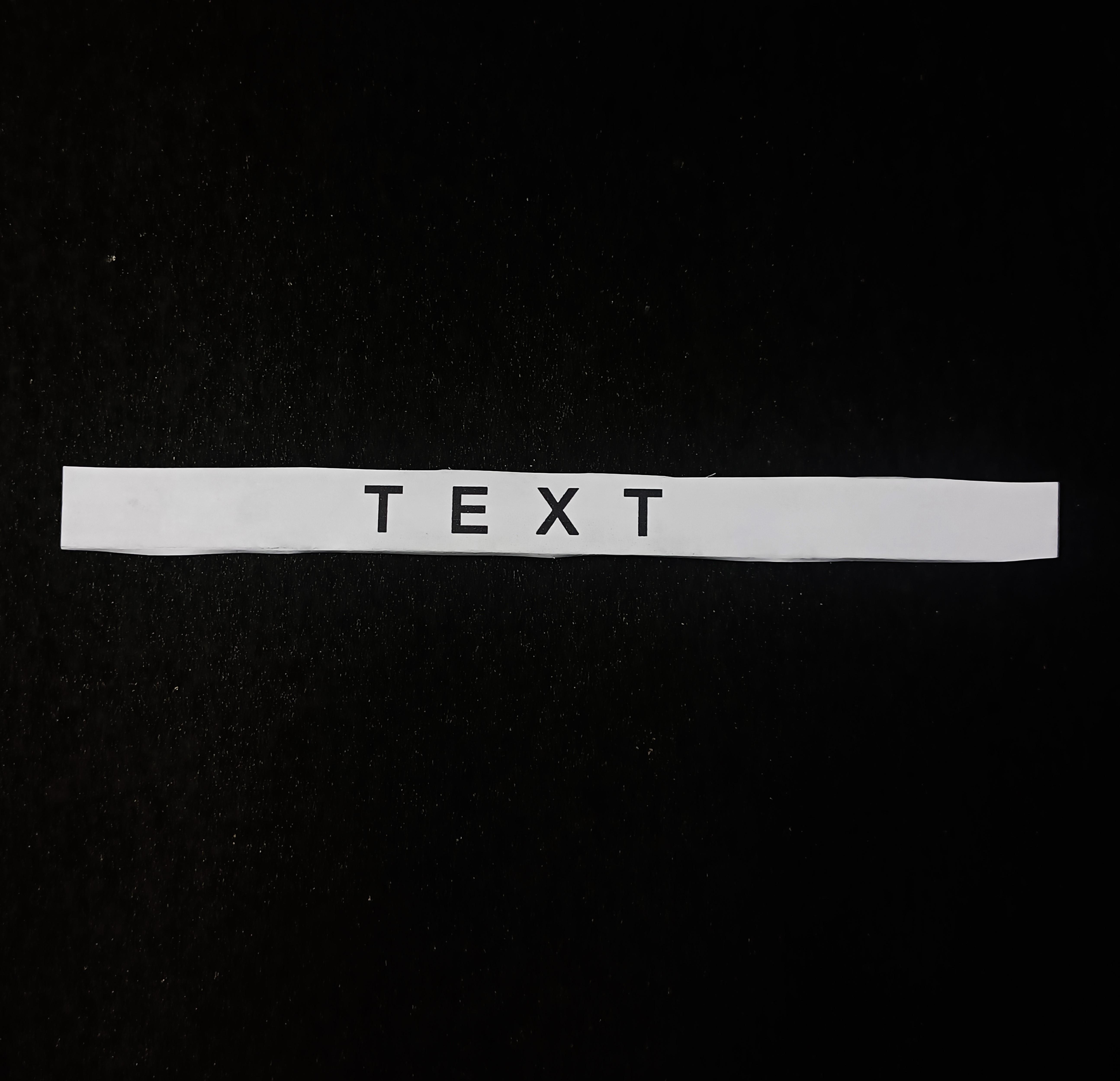 text print in black back.jpg