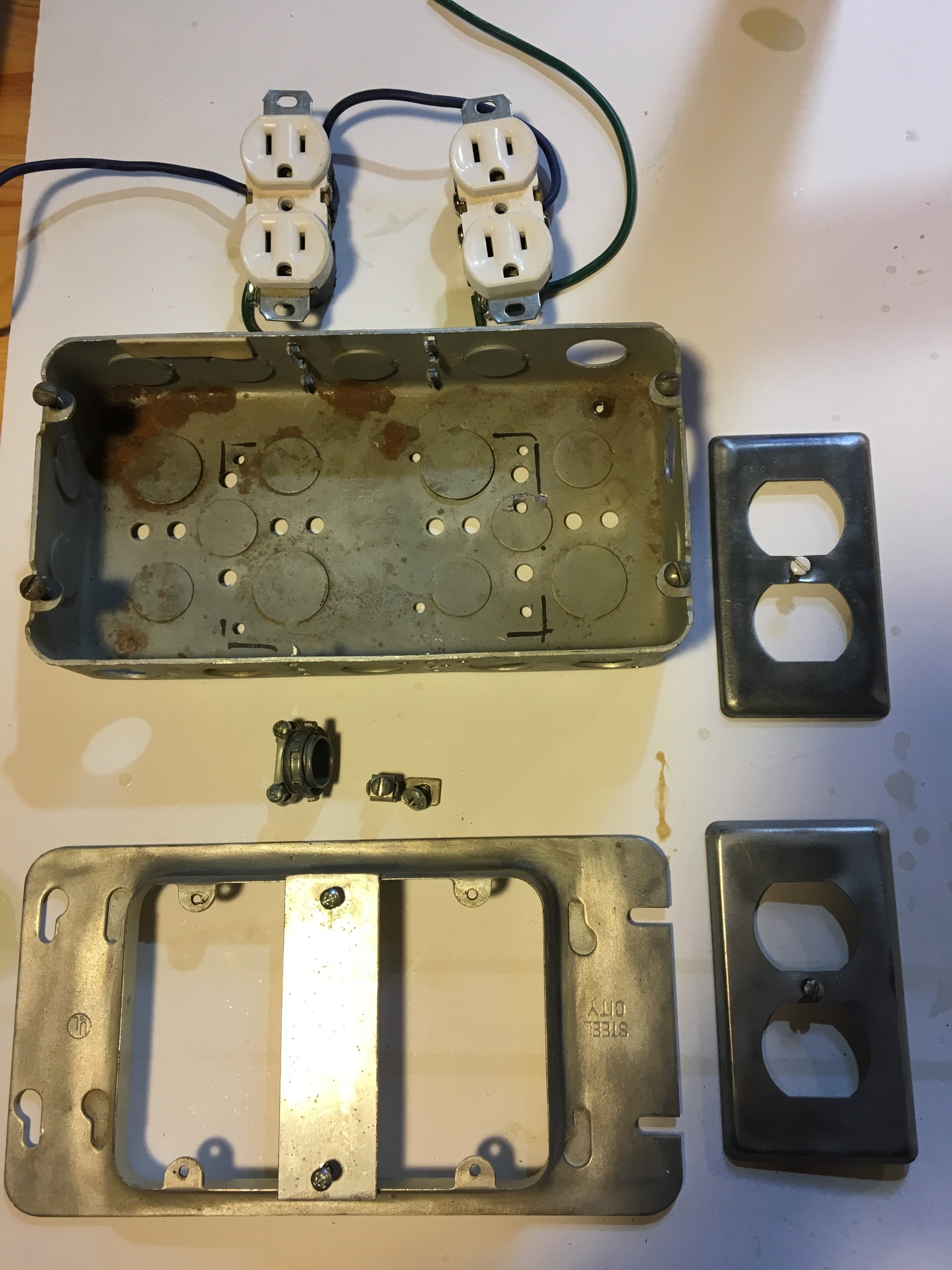 triplex box with outlets, plate and cord binder.JPG