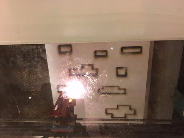 using the laser cutter.JPG