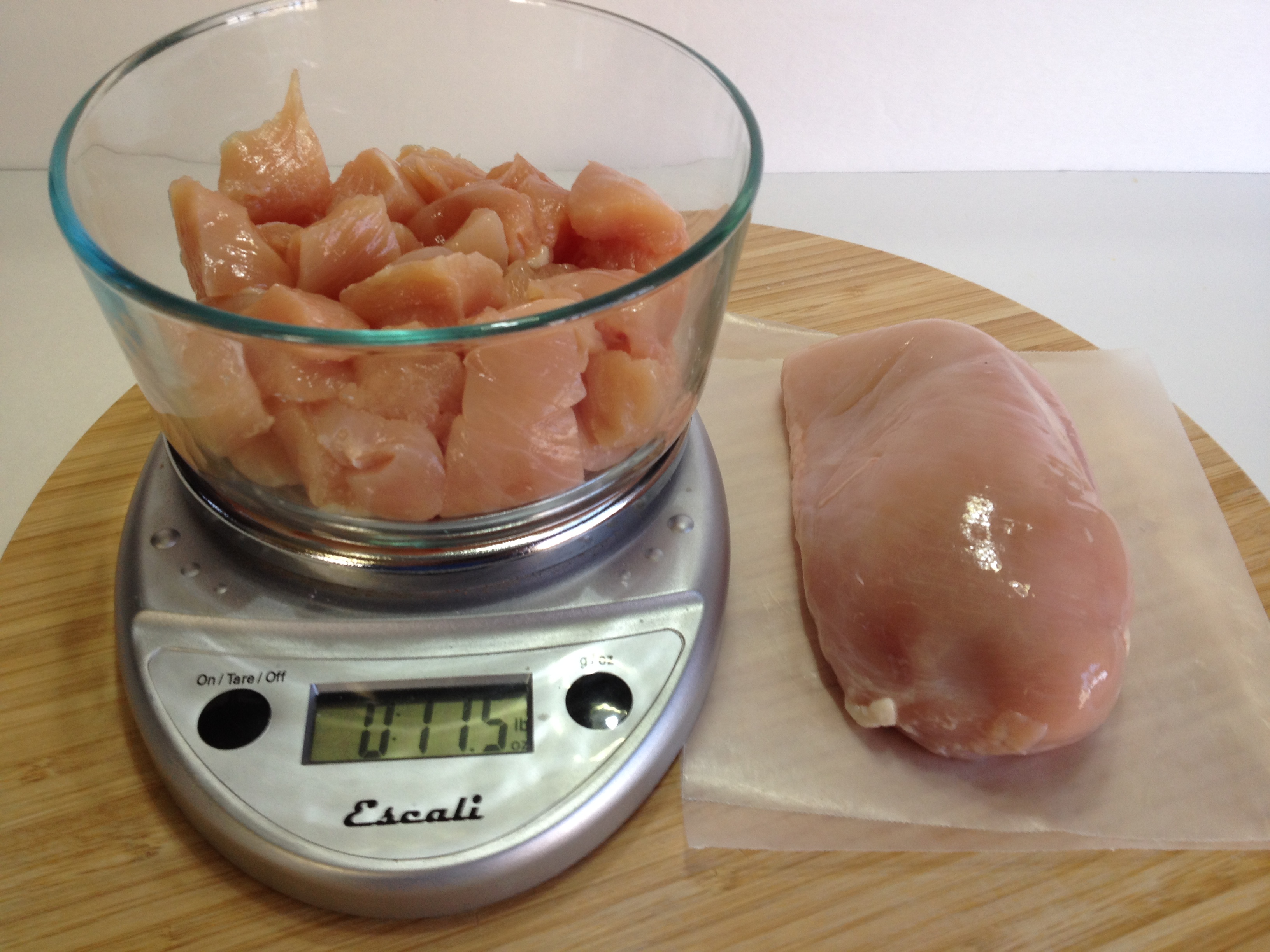 weighing and cutting chicken for Herbed Chicken Penne with Creamy Italian Cheese.JPG