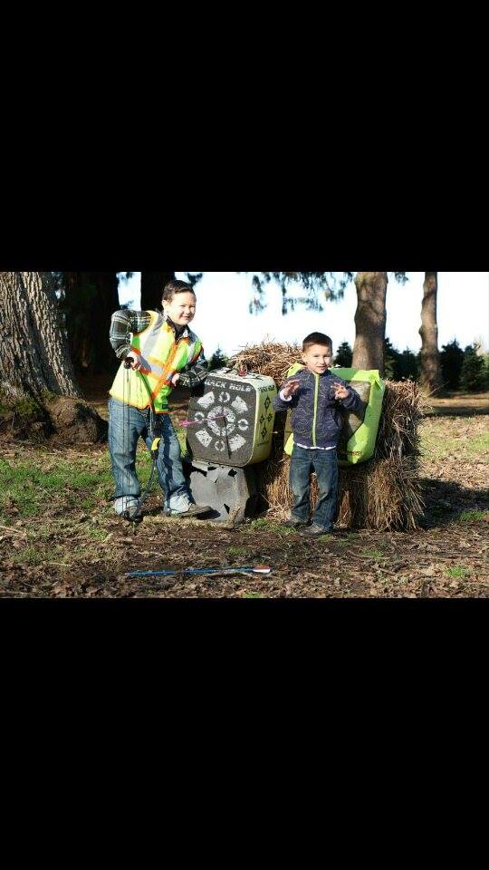 zane and mase shooting bows.jpg