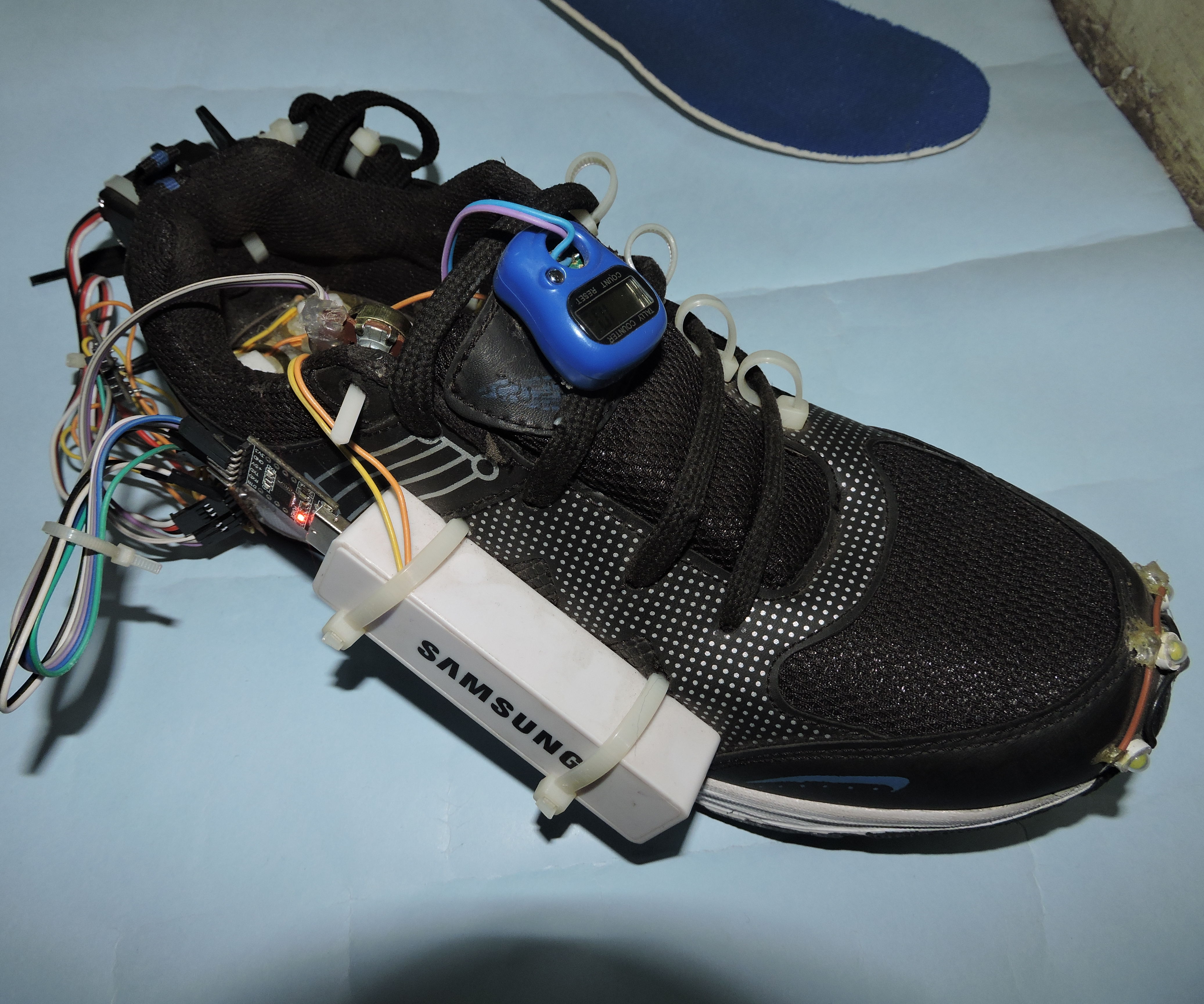 Smart Shoes (Auto-lacing and Generating Electricity)