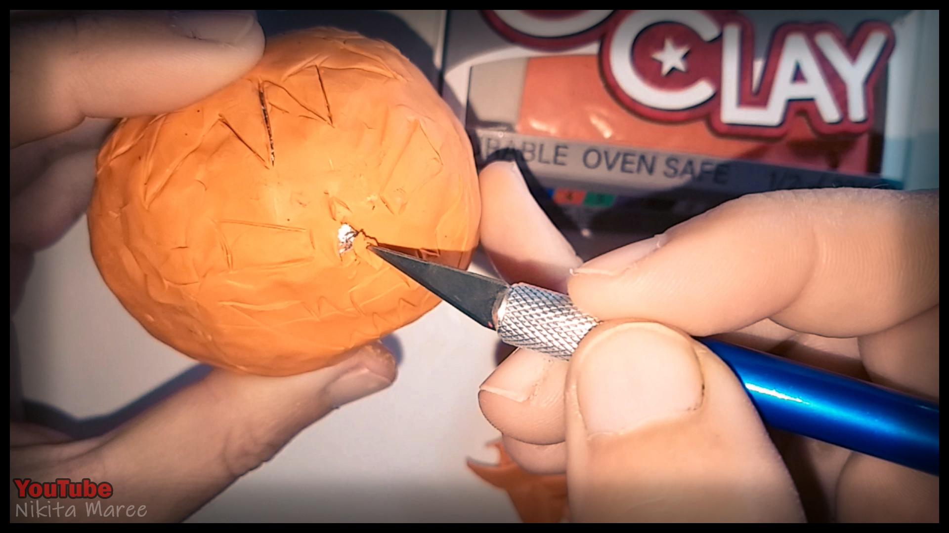 How to make a Jack o'lantern. Polymer clay tutorial. Sculpting a pumpkin out of clay. Halloween Craft.  (7).jpg