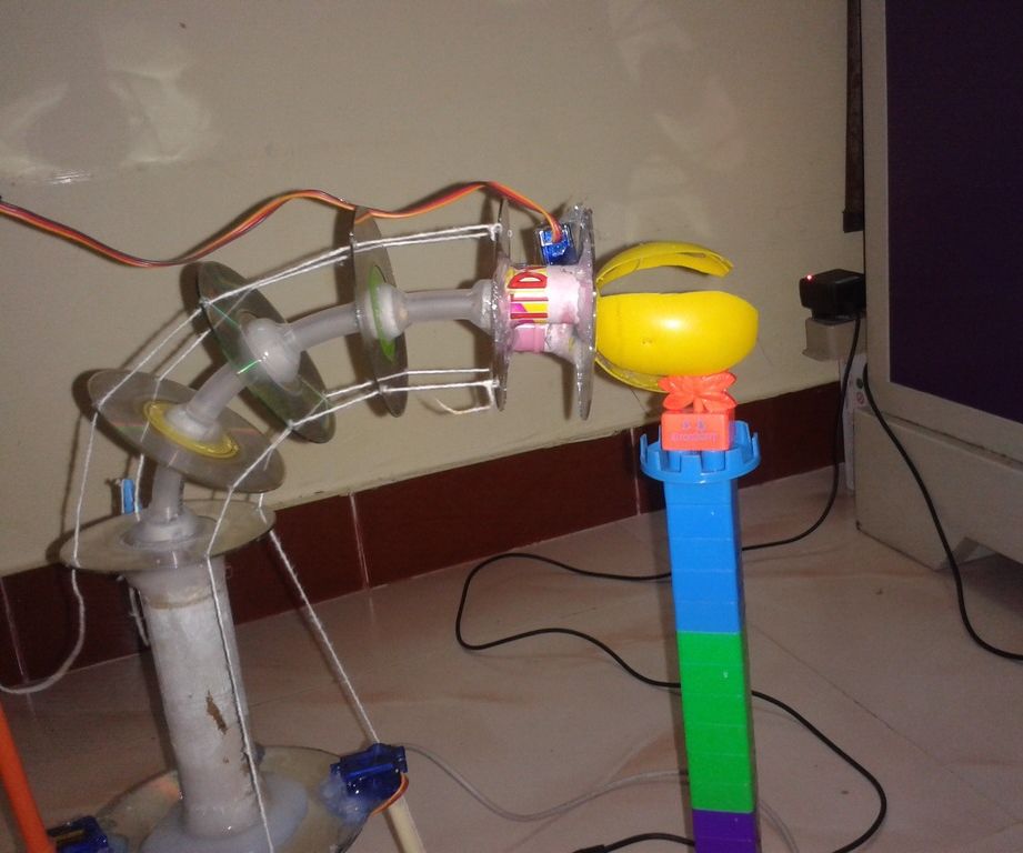 BT Mobile Ctrl Trunk Robotic Arm Using String