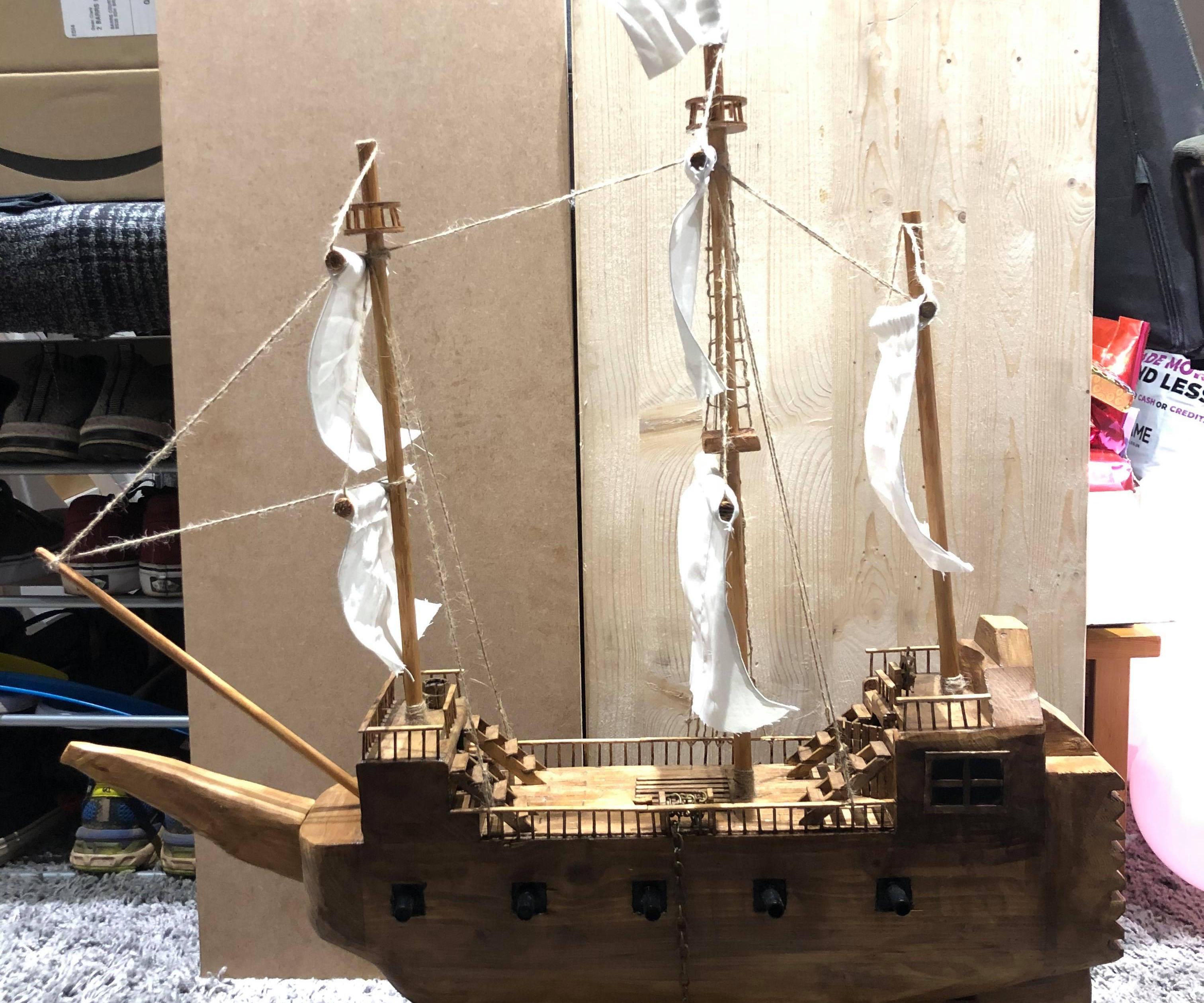 Wooden sail boat.