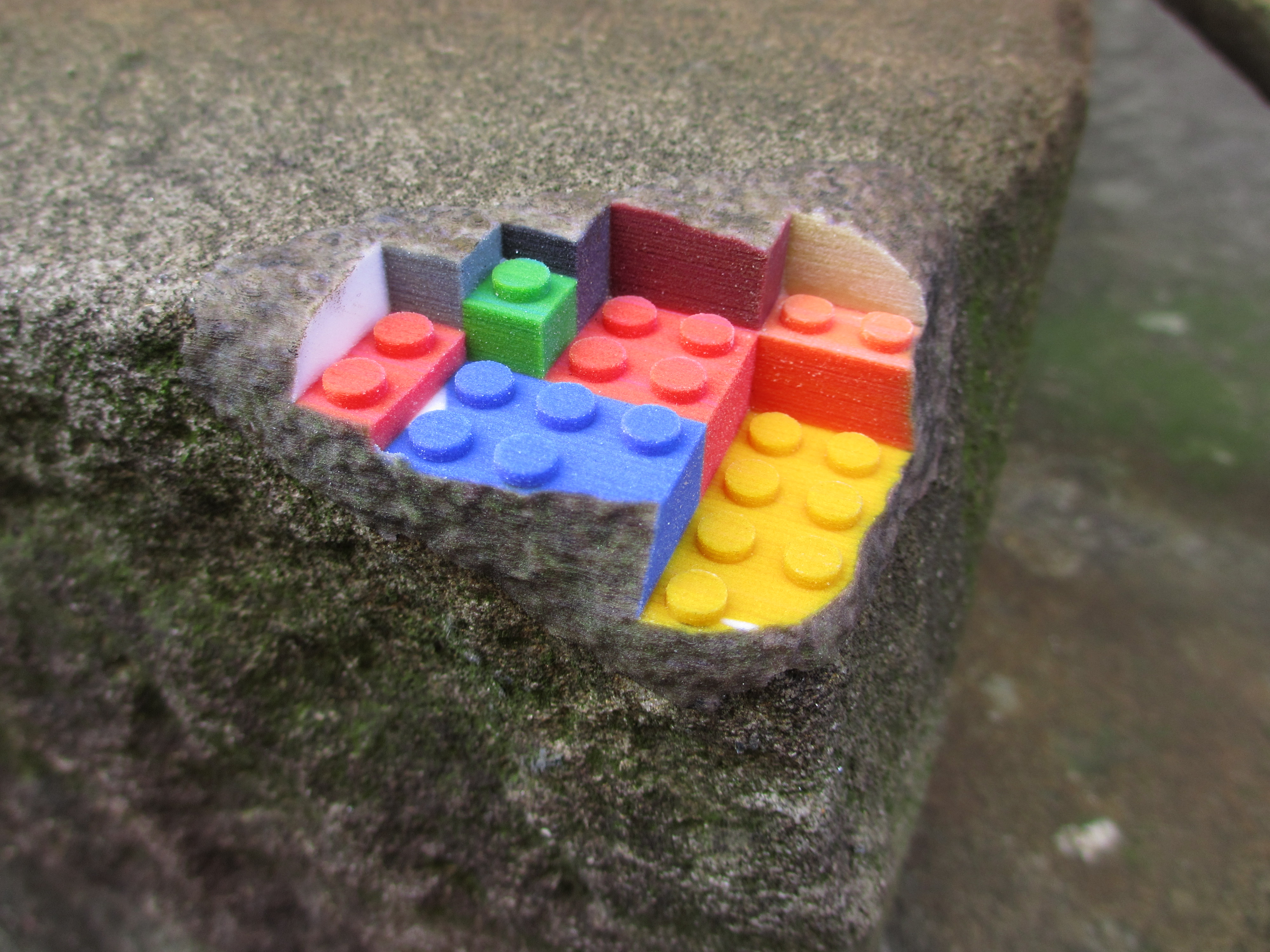 A Sandstone Block Built From Lego, Blending Real Objects With 3d Prints