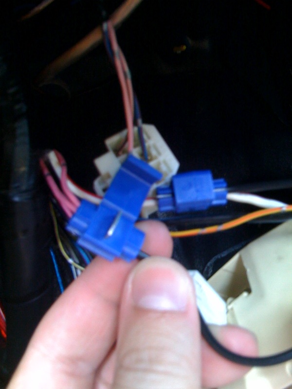 Using another tap-in clamp_ connect the other end of the fuse holder to BOTH remaining pink wires that were cut_.jpg