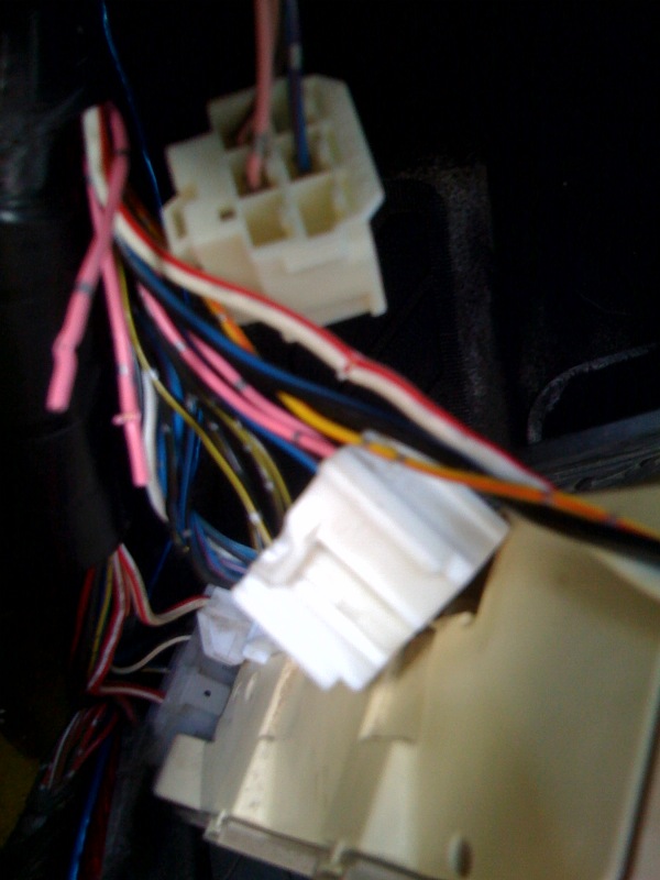 Cut both pink wires that we have removed from the connectors_ but leave a bit of wire in the car to work with_.jpg