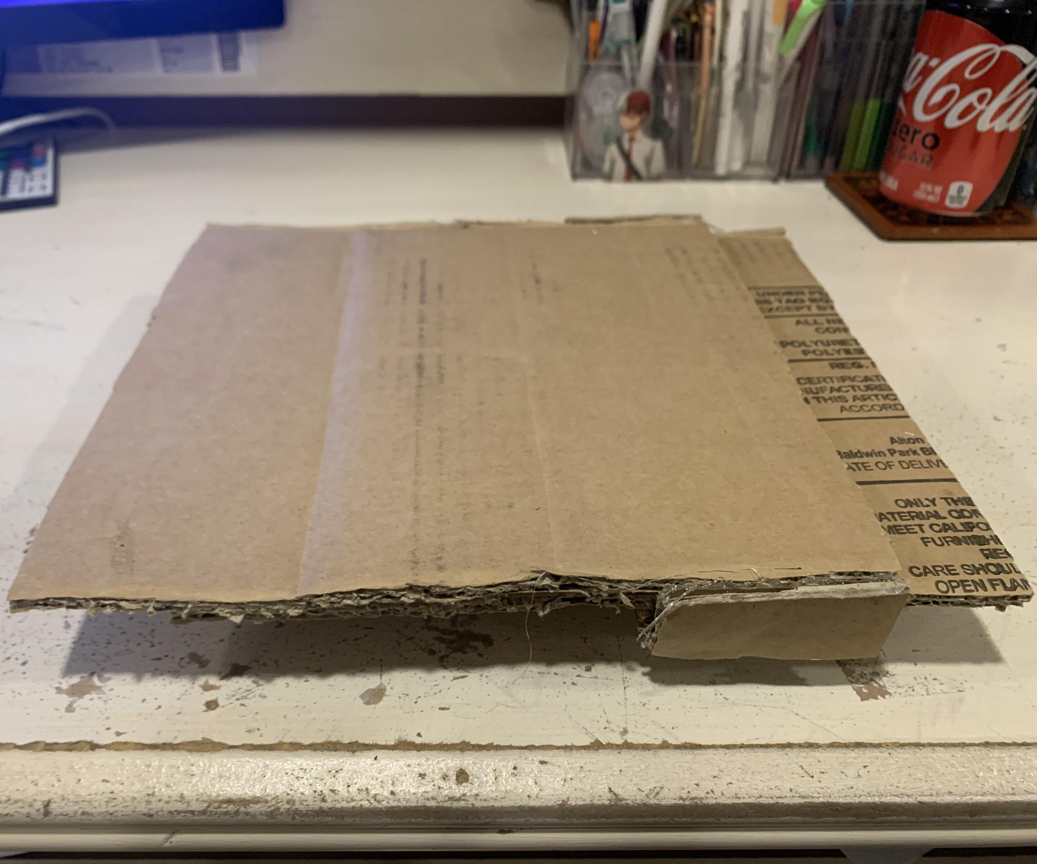 Old Cardboard Boxes to Adjustable Table!
