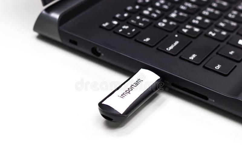 usb-flash-drive-label-word-important-connect-to-usb-port-plug-computer-laptop-transfer-data-backup-usb-flash-drive-102128023.jpg