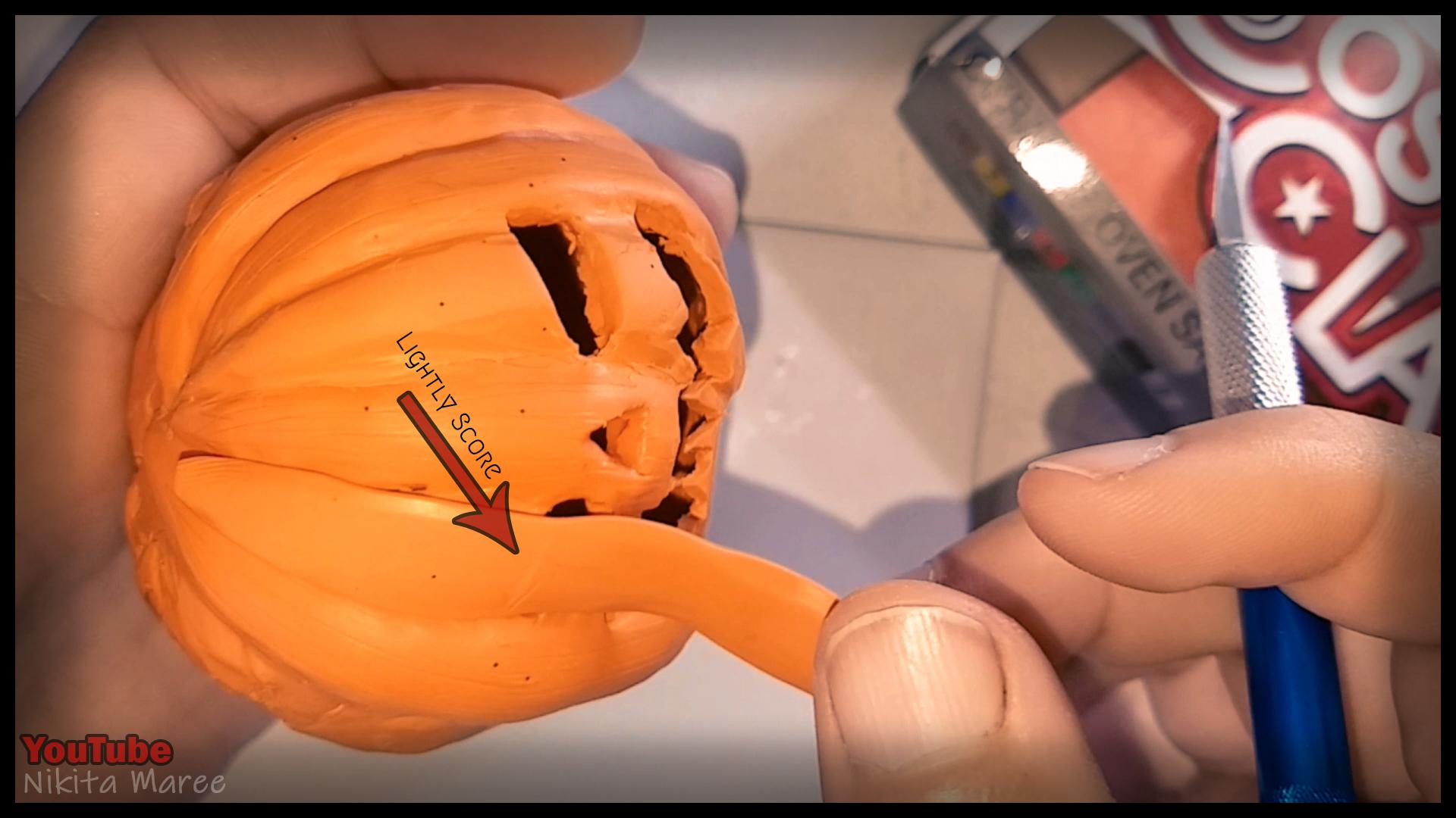 How to make a Jack o'lantern. Polymer clay tutorial. Sculpting a pumpkin out of clay. Halloween Craft.  (20).jpg