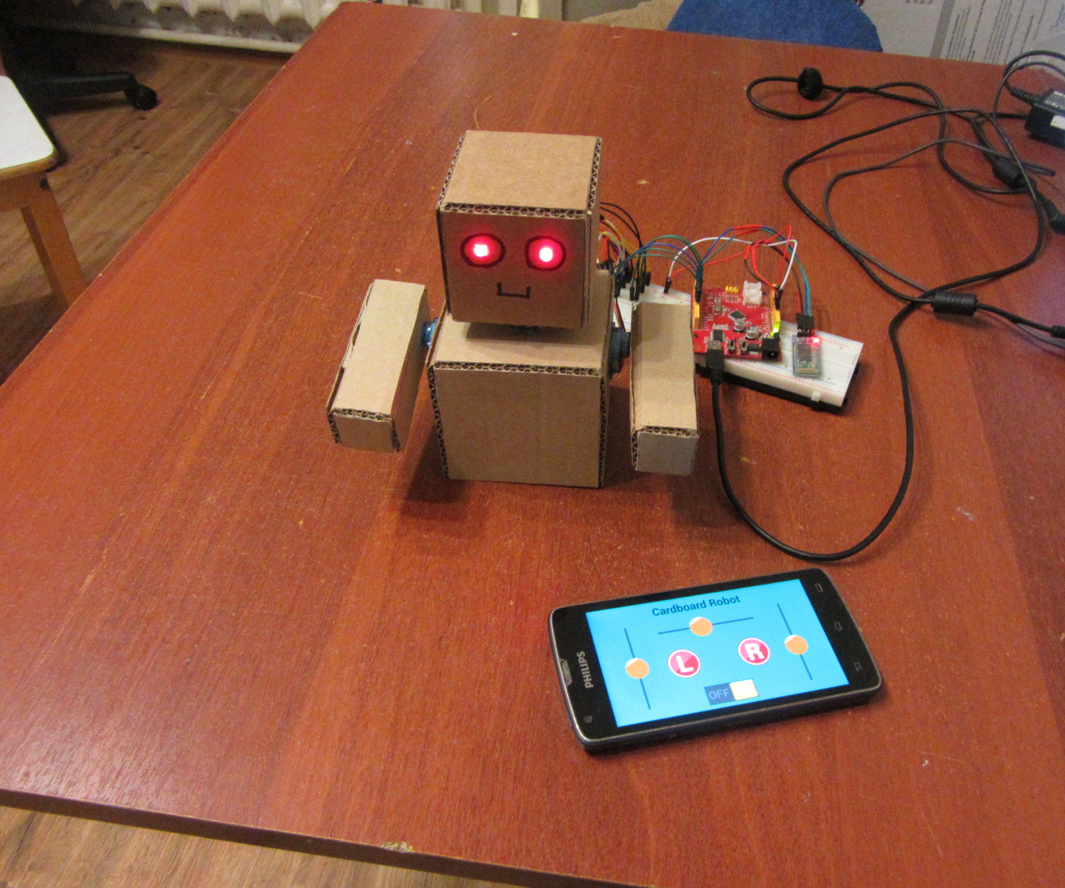 Arduino Cardboard Robot Is Controlled From Smartphone Via Bluetooth