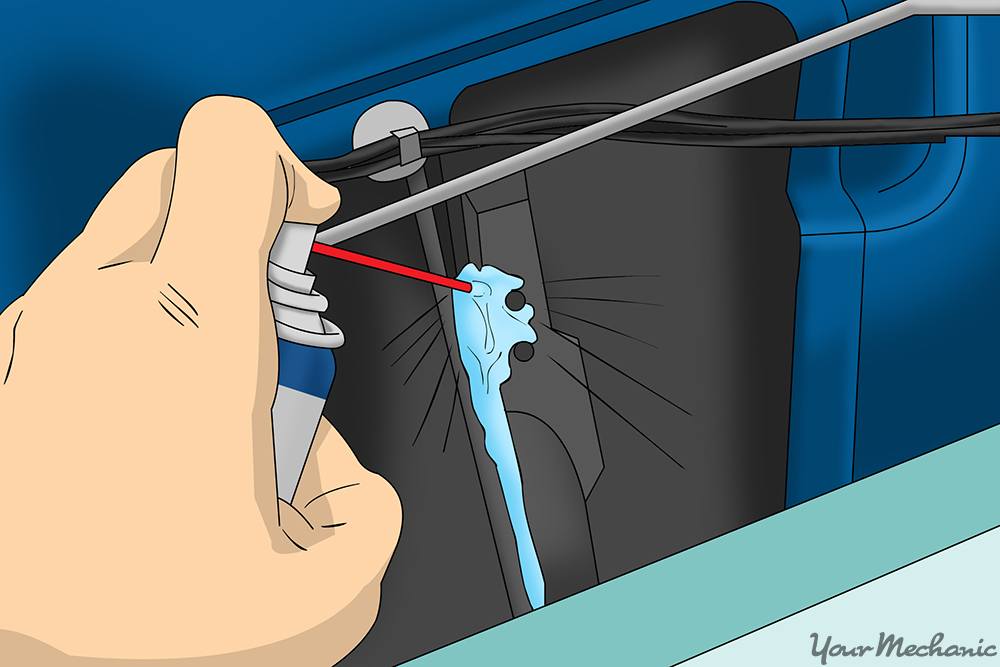 How To Fix Common Electric Window Issues - 4 Spray path of silicone spray on rubber parts white grease on contact points and pulleys.jpg