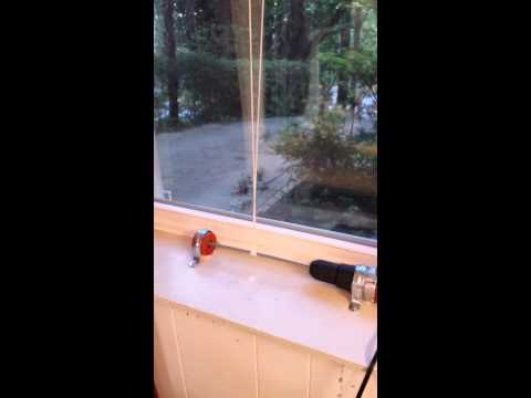 Remote Controlled Window Lifter by Steve M. Potter "WindowMoto"