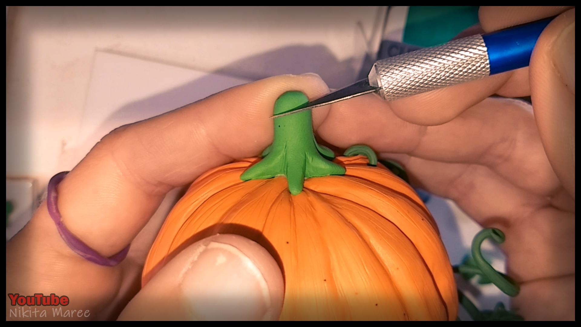 How to make a Jack o'lantern. Polymer clay tutorial. Sculpting a pumpkin out of clay. Halloween Craft.  (56).jpg