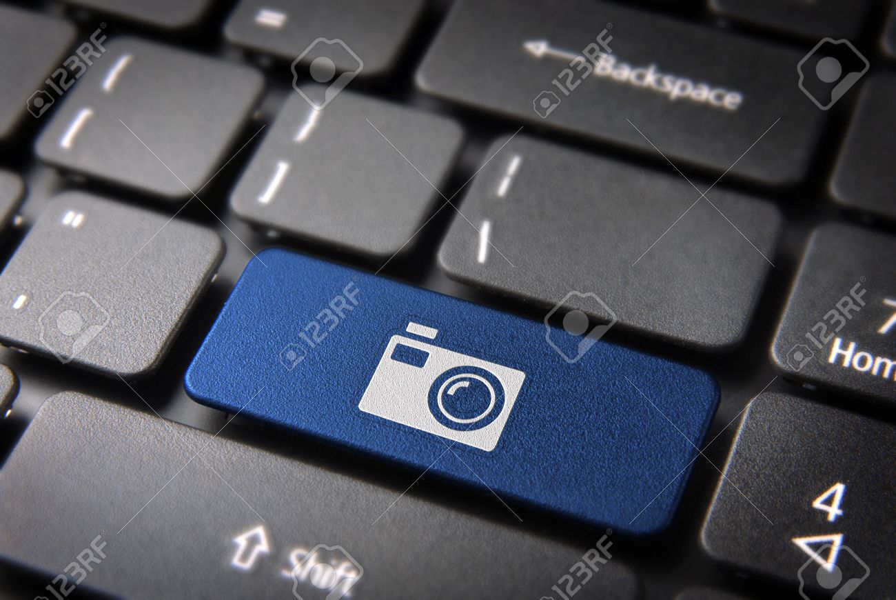 20851357-Entertainment-key-with-Camera-icon-on-laptop-keyboard-Included-clipping-path-so-you-can-easily-edit--Stock-Photo.jpg